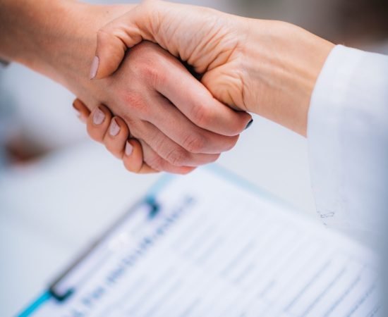 Handshake After Signing Health Insurance Form